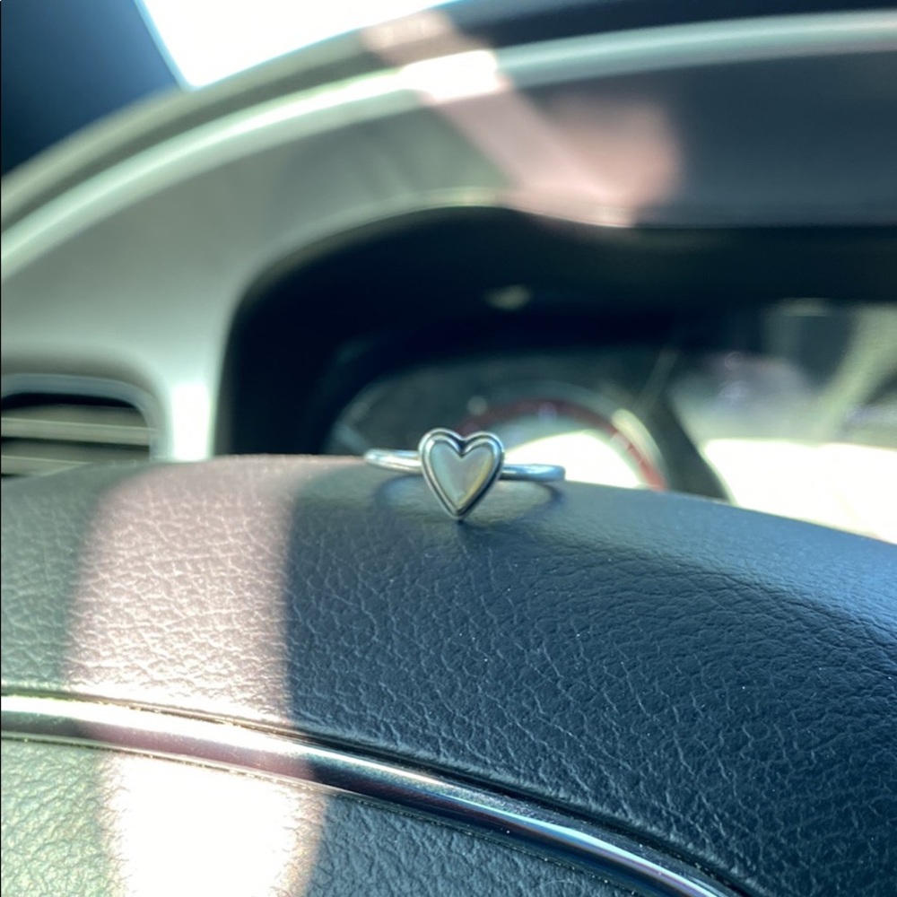Only wore for a few months, heart is opal. I just don’t wear it anymore!